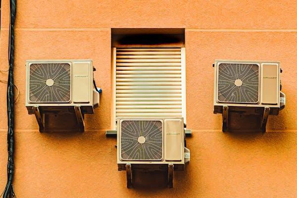 building-wall-with-air-conditioners