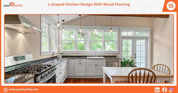 L shaped kitchen with wood flooring