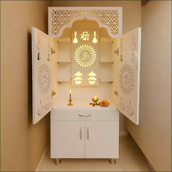 Compact pooja room design with cabinets