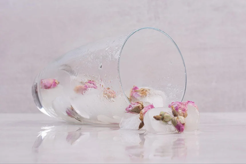 Silica gel cured flowers in a glass