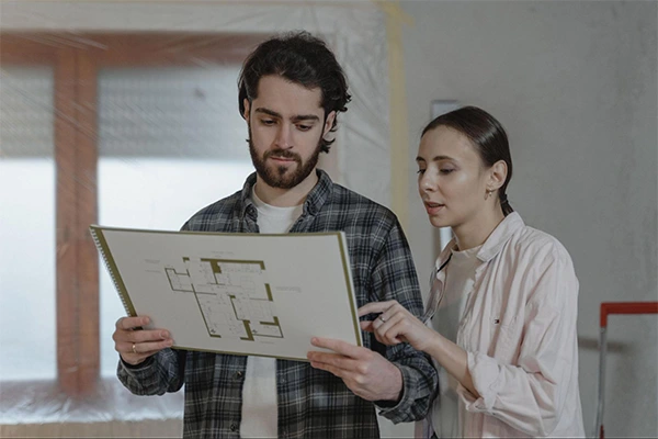 Homeowners Reviewing House Design