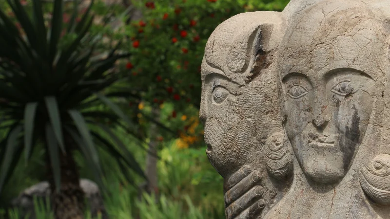 Sculpture garden with artistic sculptures and landscaped greenery