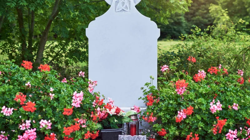 Memorial garden with flowers, trees, and peaceful pathways