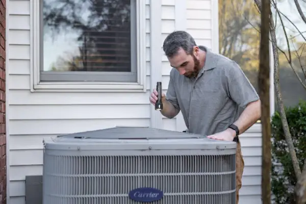 technician-inspecting-outdoor