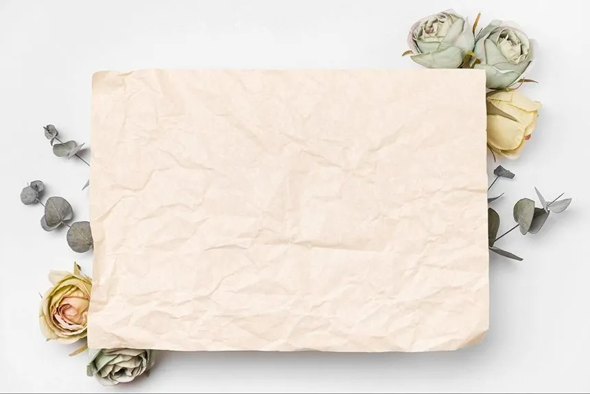 A parchment sheet to arrange flowers for pressing