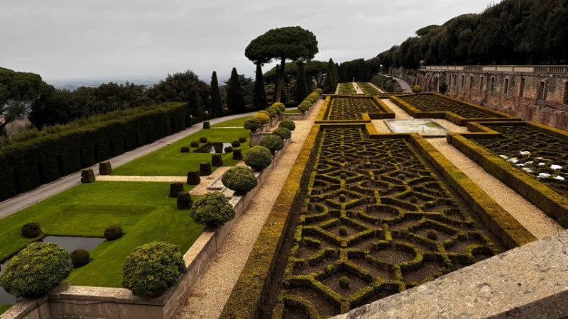 Renaissance garden with topiary and marble fountain