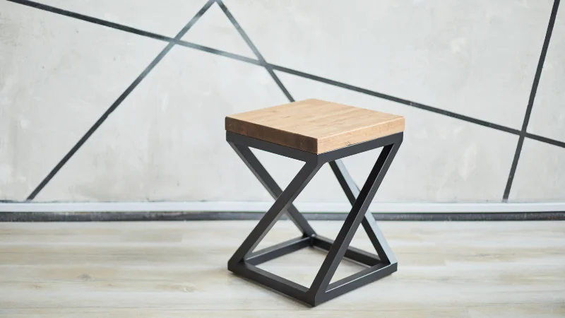 Wooden X-frame stool for seating