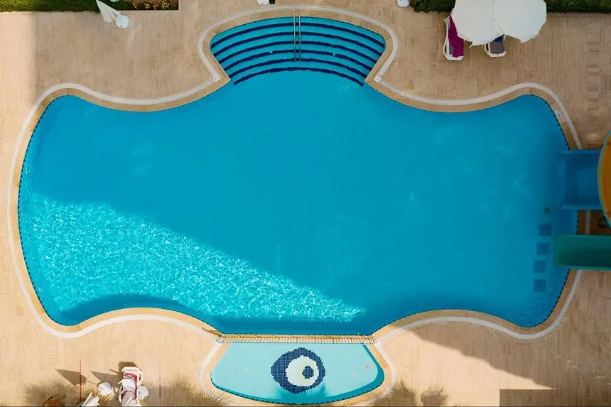 Freeform pool with natural landscaping
