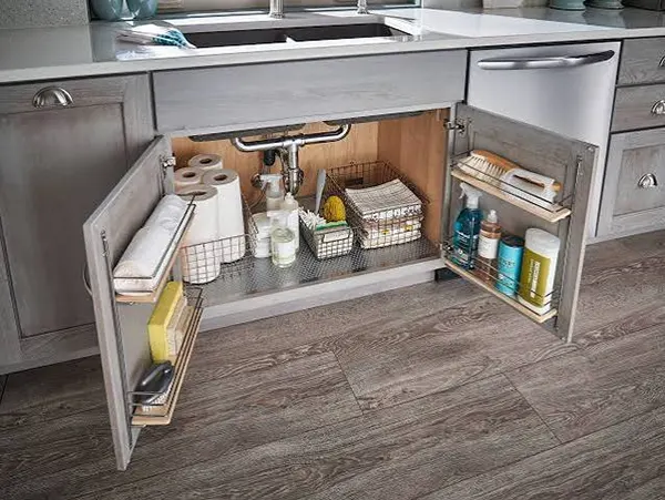 Image of a clean kitchen cabinet under the sink.