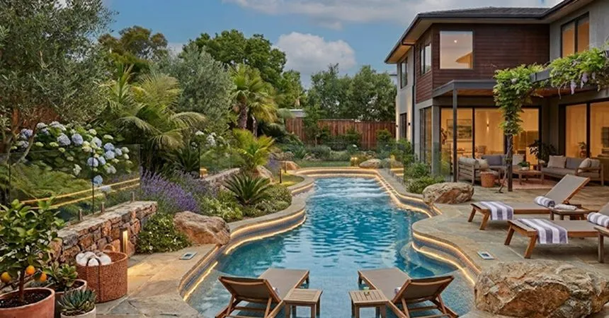 Pool with tanning ledge and beach entry